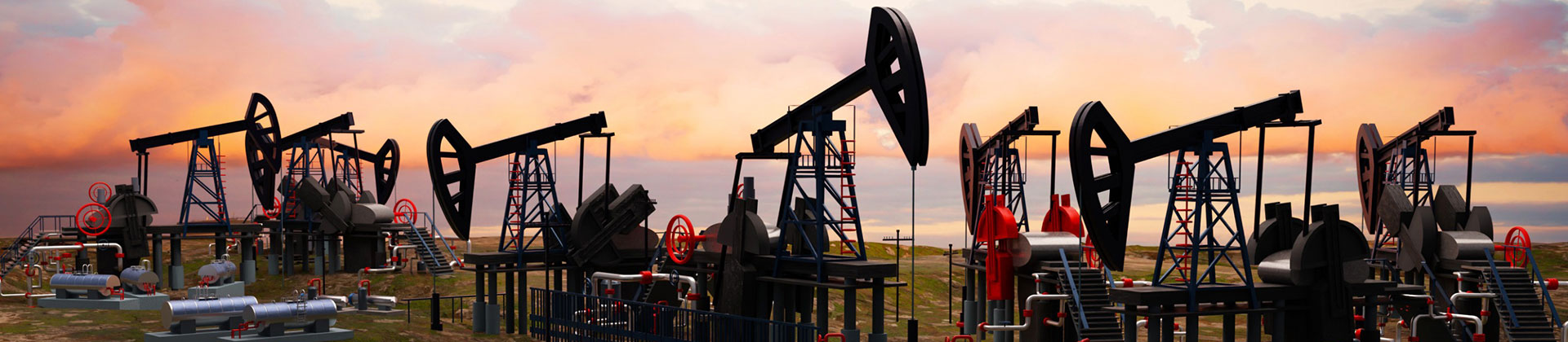 A Line of Oil Derricks Along a Body of Water