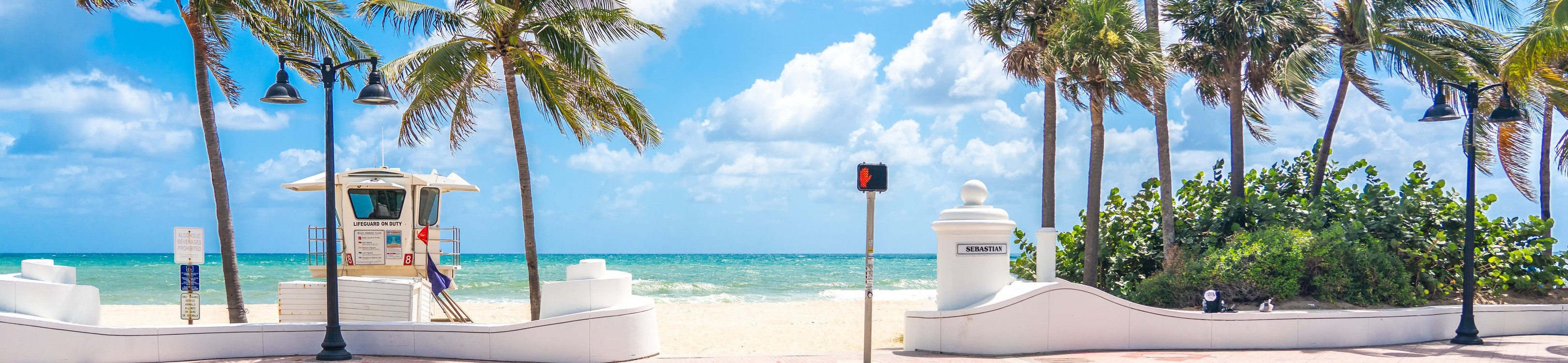 Sewage Effluent Disposal by Ocean Outfalls Florida Beachfront Scene With Palms and Lifeguard Station